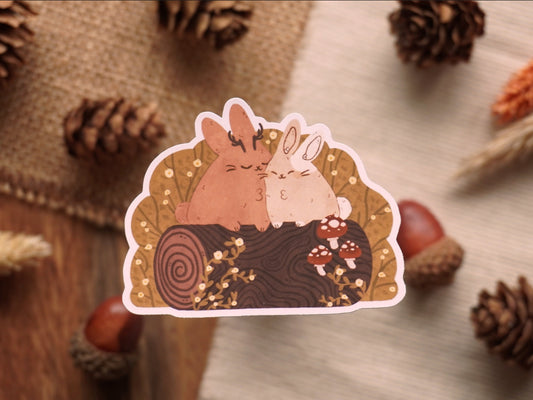 Bunnies on Log Sticker